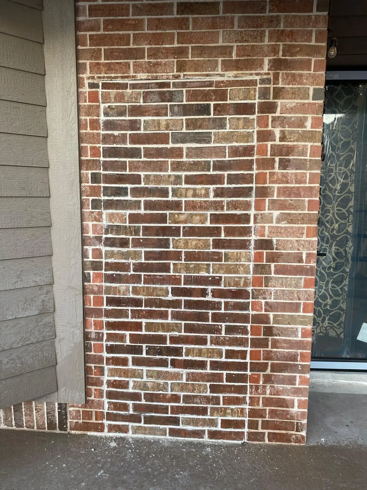 Brick chimney wall with repointed mortar joints