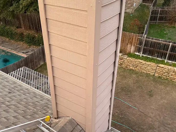 Chimney chase with new siding