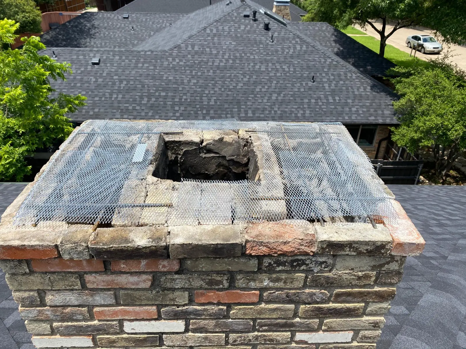 Mesh screen fitted on a chimney top to keep animals out